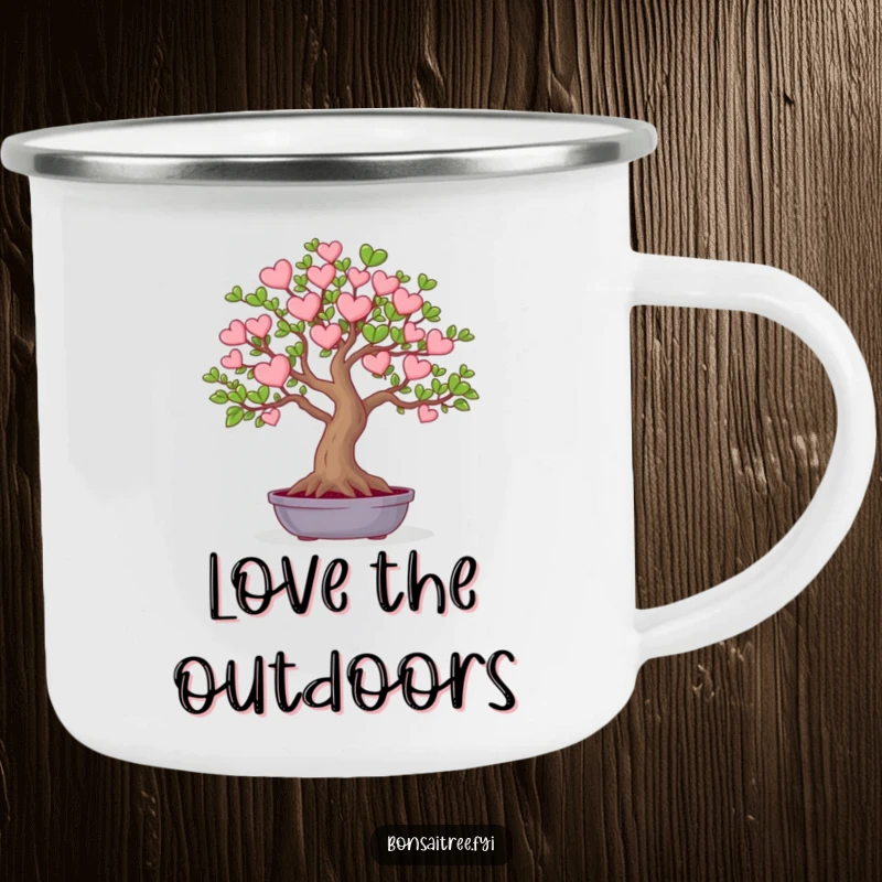 Funny enamel camping mug featuring a bonsai tree with leaves shaped like small hearts. Great for outdoor enthusiasts who appreciate sweet humor.