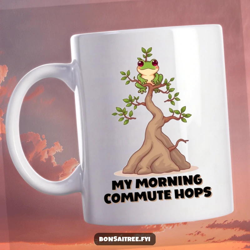 Funny mug showing a playful bonsai tree character perfectly balancing a small green frog on its uppermost branch.