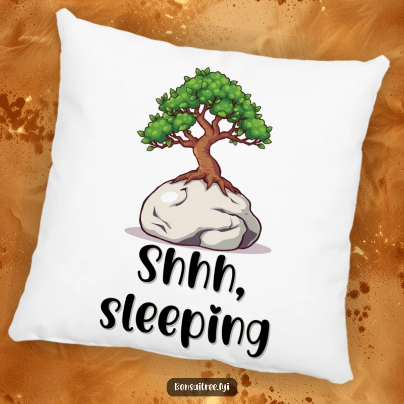 Funny decorative pillow showing a bonsai tree with eyes peeking from behind a small rock, perfect for adding cozy and mysterious vibes.