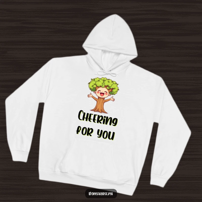 Funny hoodie showcasing a miniature bonsai tree with its arms outstretched in a happy cheer. Perfect for cozy days and spreading positive energy.