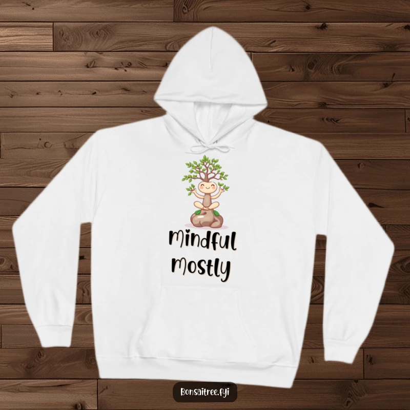 Funny hoodie featuring a contented bonsai tree in a yoga pose, offering comfort and humor, an excellent funny gift.