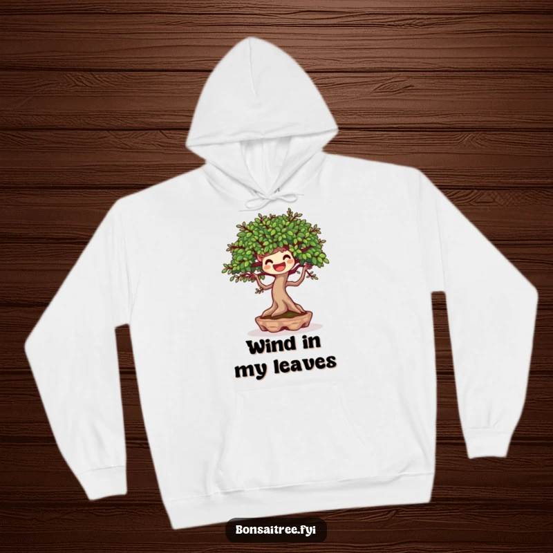 Funny hoodie depicting a joyful bonsai tree character dancing rhythmically with a gentle breeze, radiating happiness.