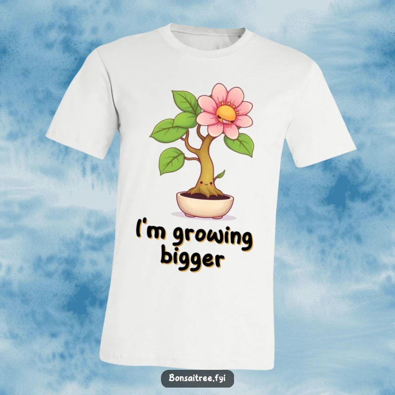 Funny t-shirt featuring a happy bonsai tree with a wide smile, sprouting an enormous, colorful flower, symbolizing cheerful growth.