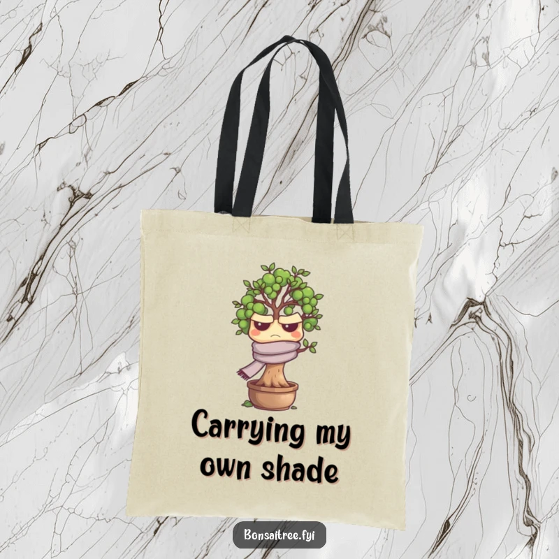Funny grumpy bonsai tree character looking annoyed on a tote bag, great for shopping or everyday use, a humorous accessory.
